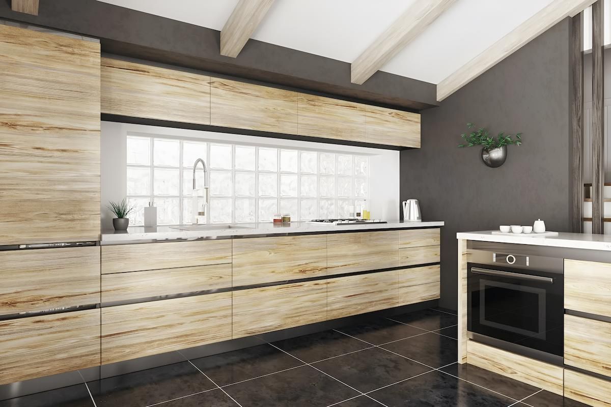 A Kitchen With Wooden Cabinets and Stainless Steel Appliances — CK Cabinetry in Coolum Beach, QLD