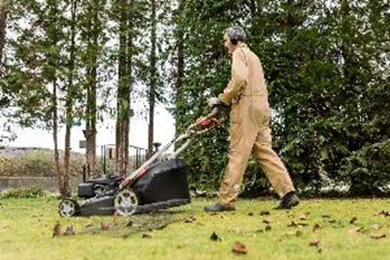 A Man Mowing - Cincinnati, OH - Nature Plus Lawn & Irrigation