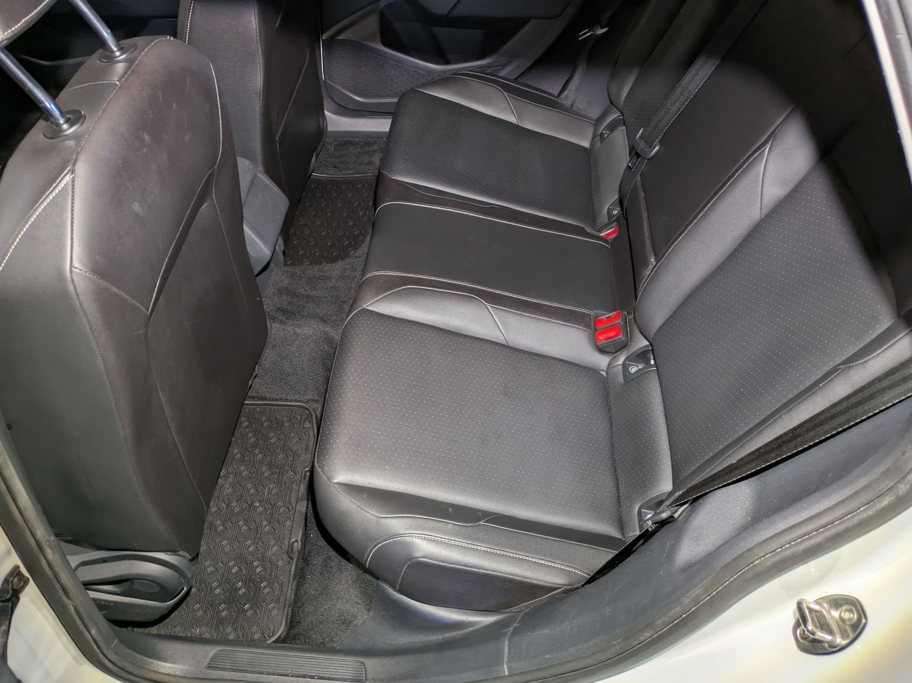 A close up of a seat in a vehicle.