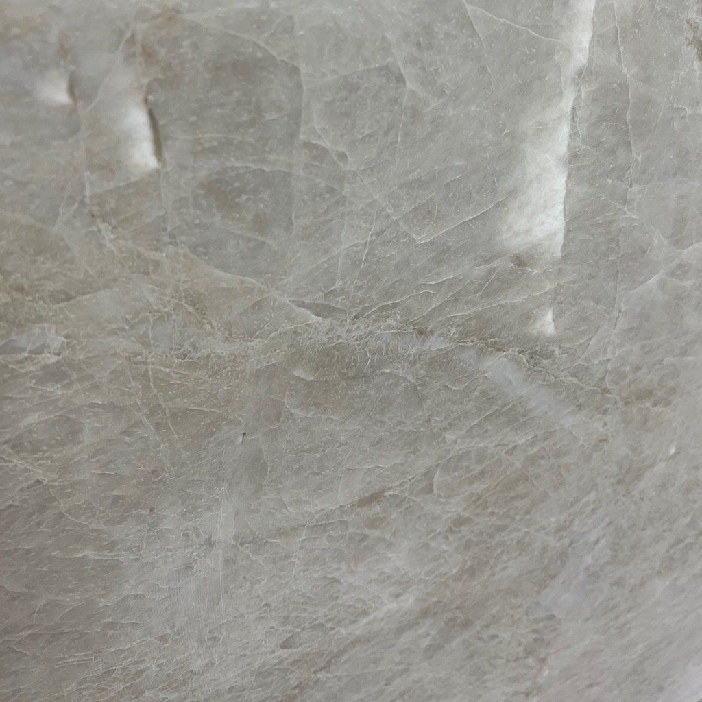 A close up of a gray marble tile.
