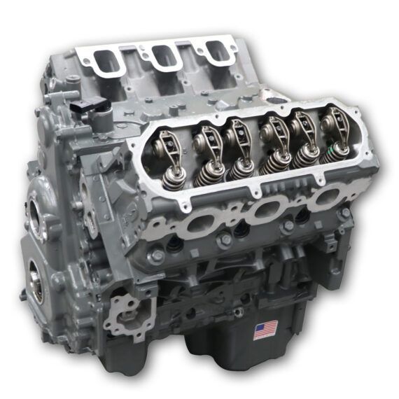 Gray V8 engine, partially disassembled, showing valve train and cylinder heads.