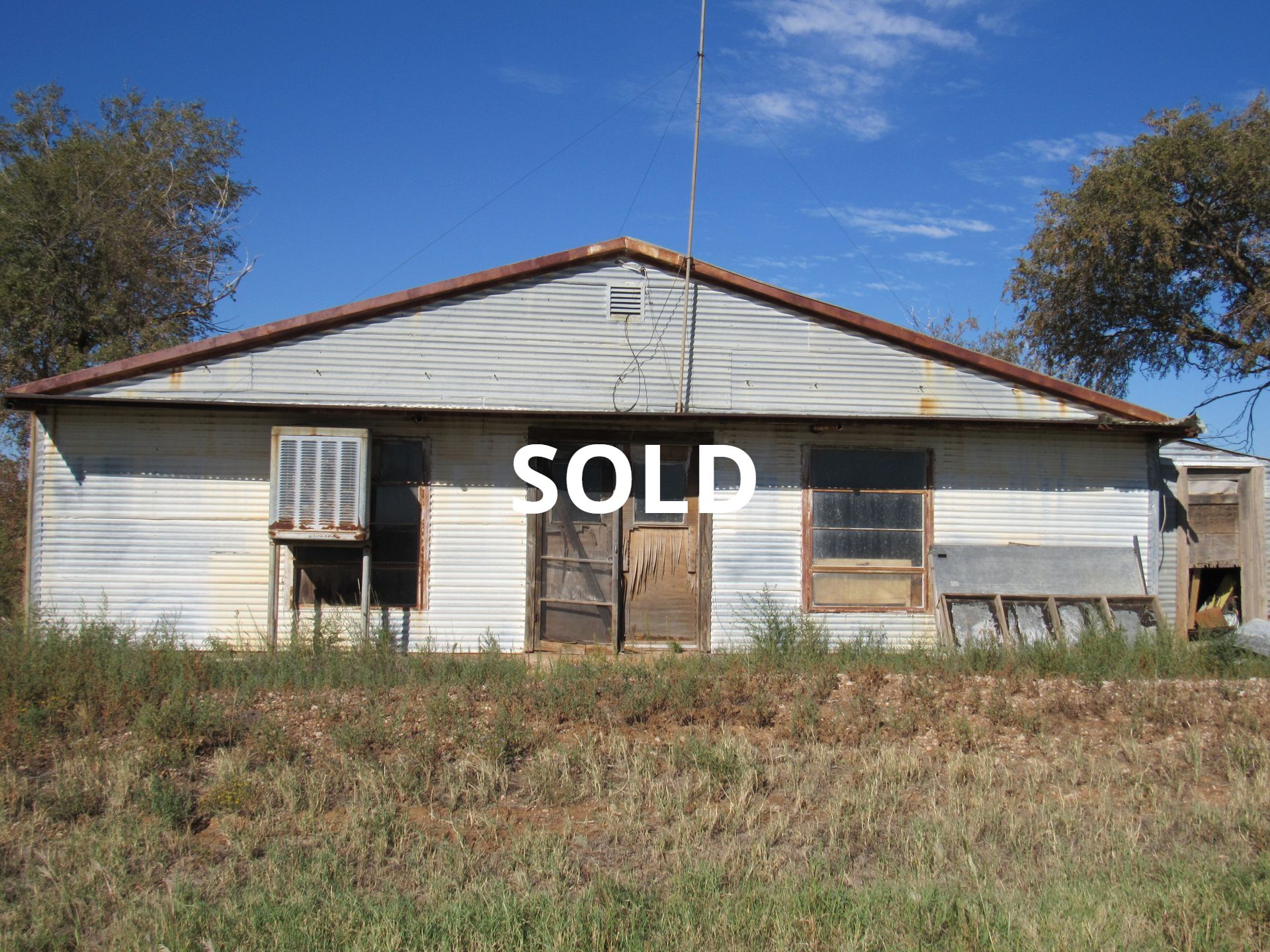 A house that has the word sold on it