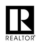 A yellow and green logo for real estate and realtor