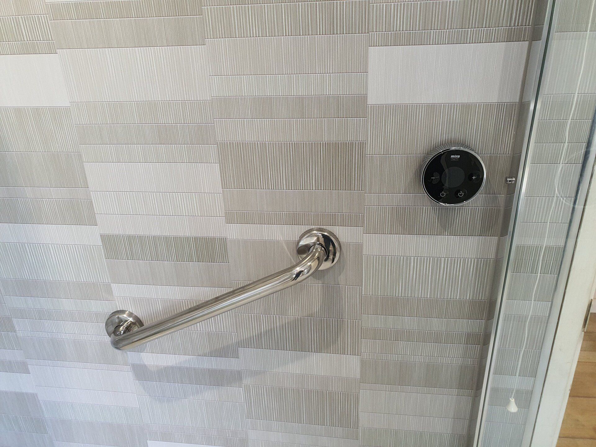 accessible bathroom with Grab rails to improve safety