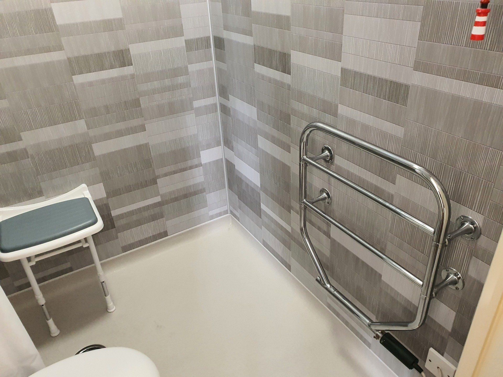 walk-in shower with a seat