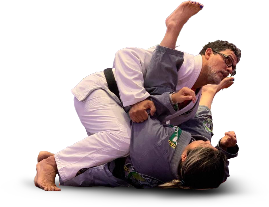 two men are fighting each other in a jiu jitsu match