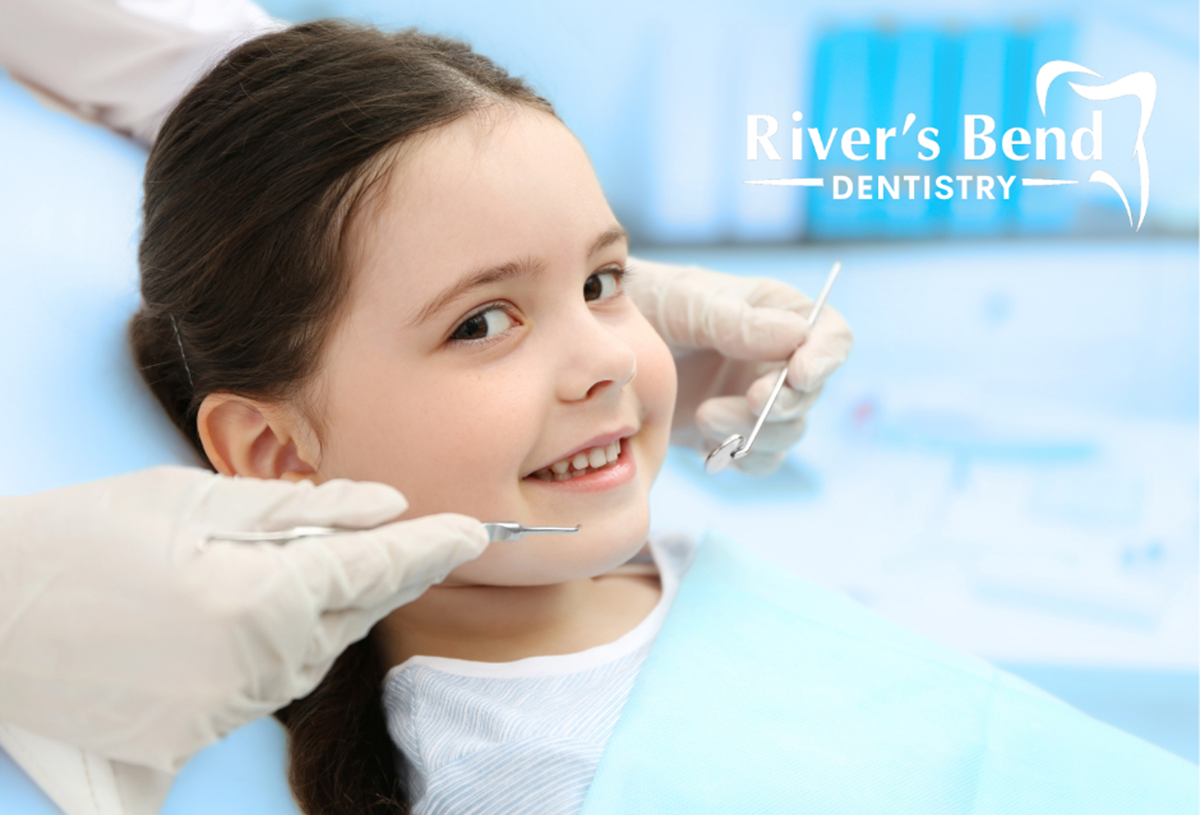 young girl in dental chair