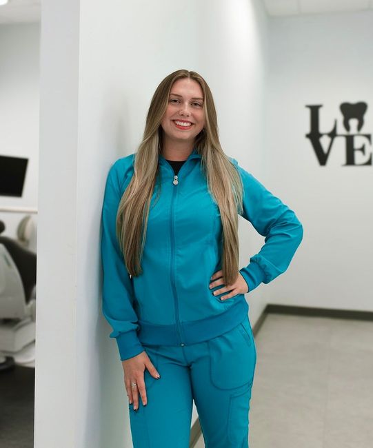 Lizzie, front desk at our dental care facility