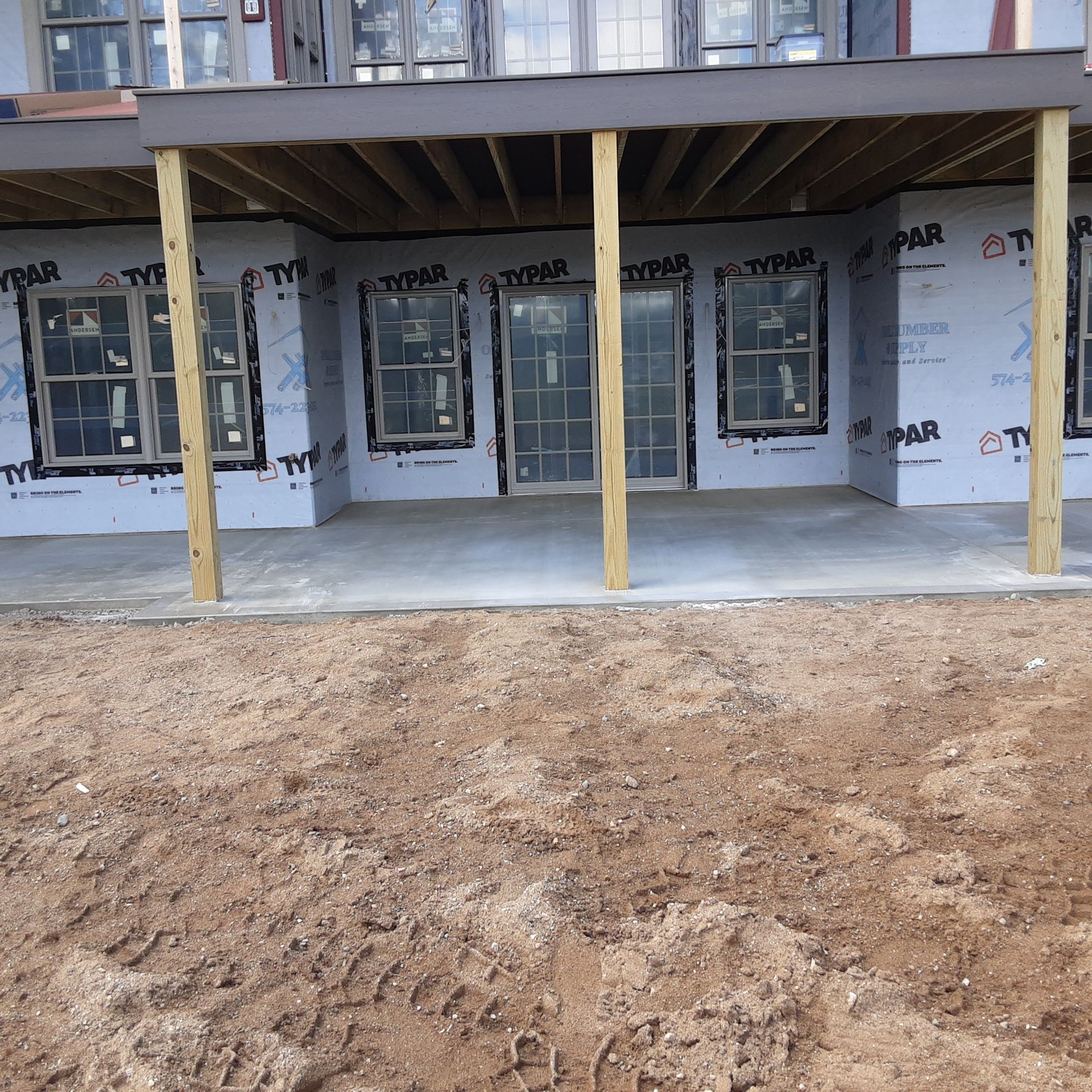 A house under construction with styrofoam on the walls