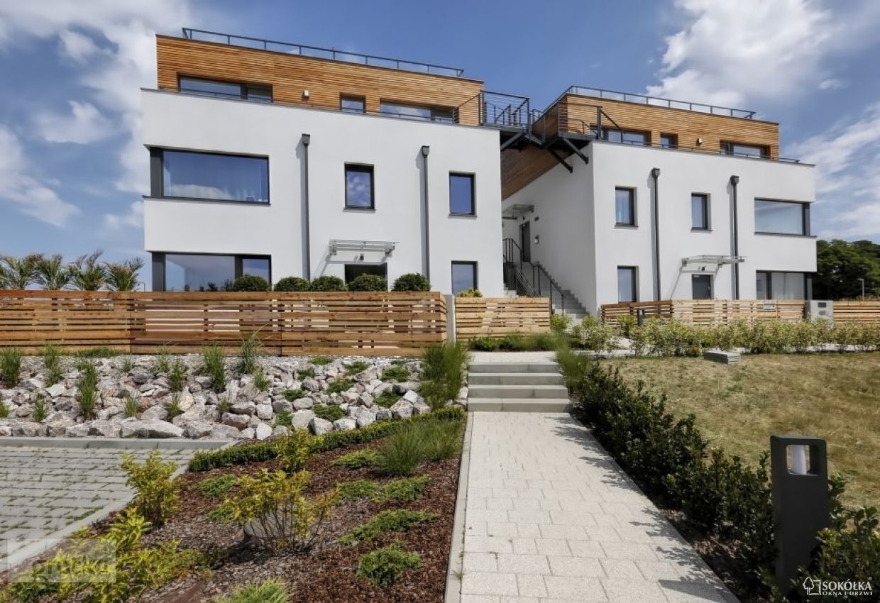 a large white building with stairs leading up to it
