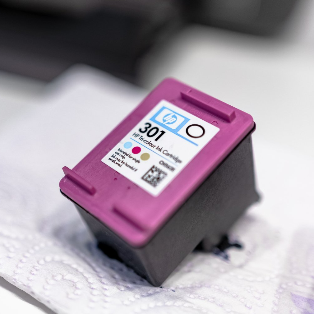 A purple ink cartridge with the number 301 on it