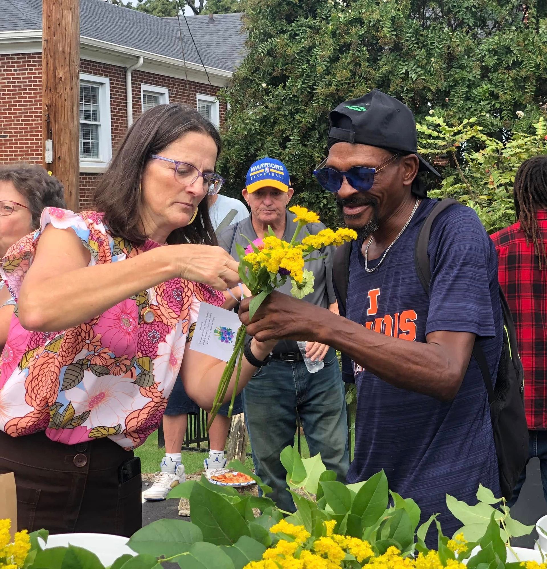 Making flower bouquets to distribute around town.