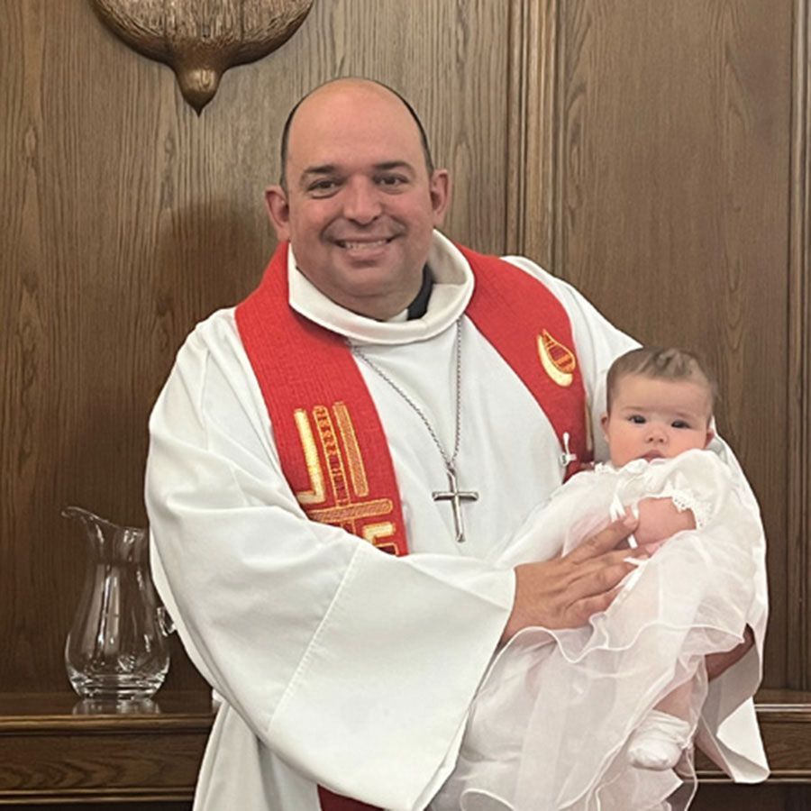 Pastor Paul with the recently baptized.