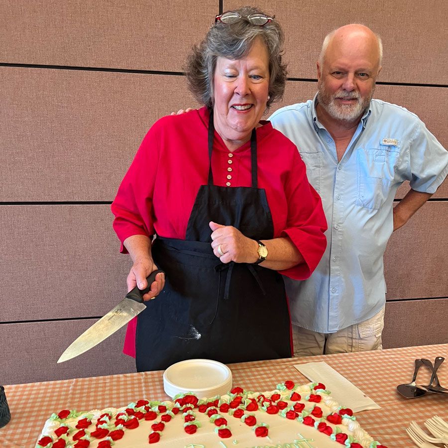 Serving up some cake for Lowrance teachers and staff.