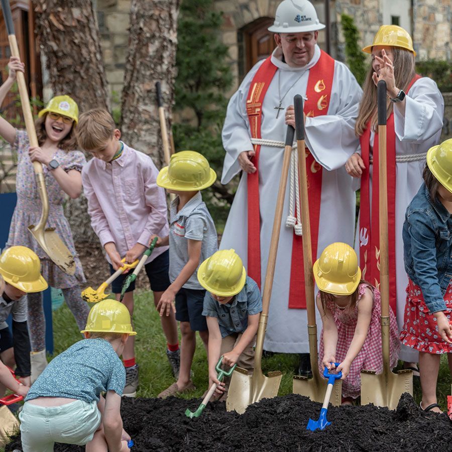Kids participate in the ground breaking for campus renewal.