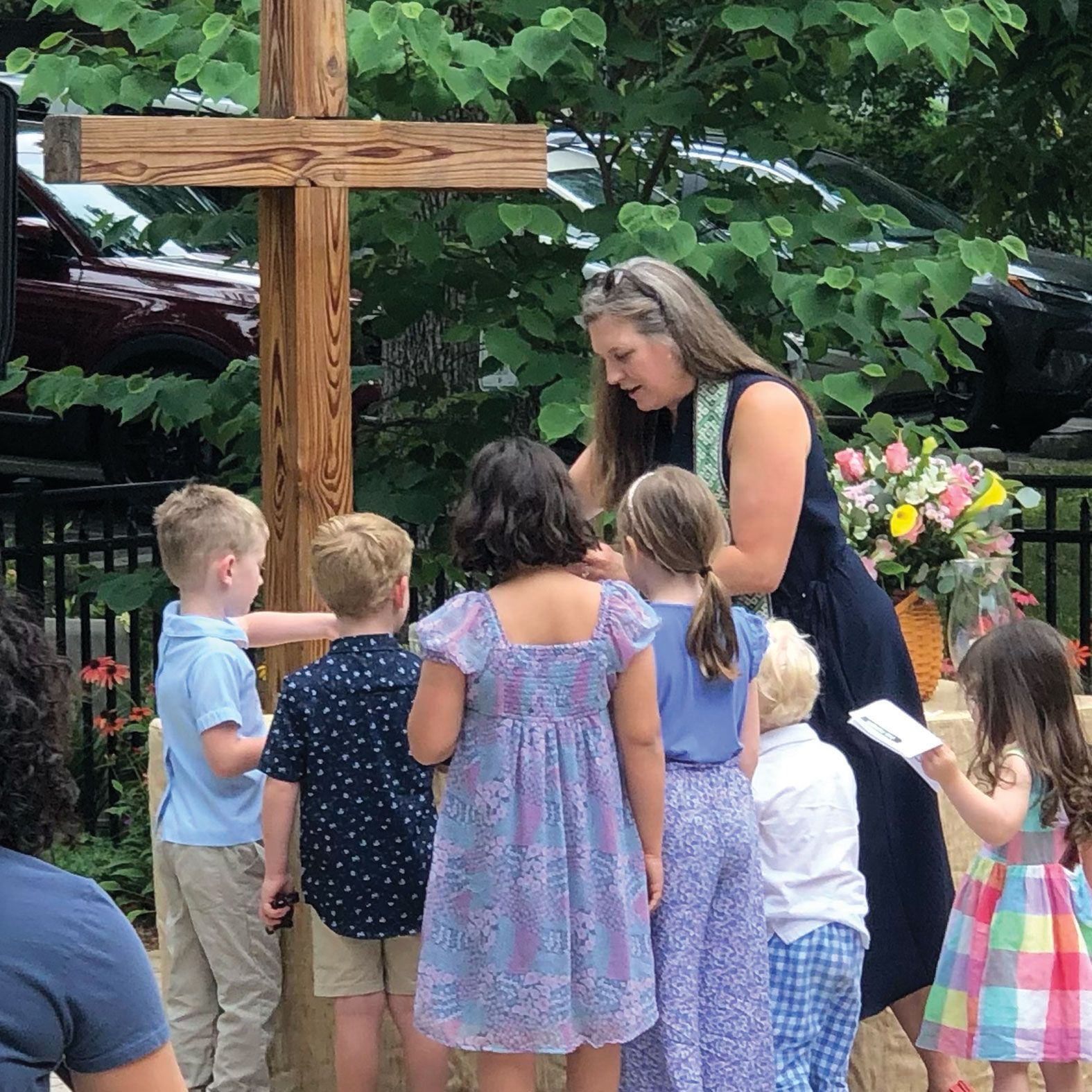 Pastor Katie with littles during OGS service.