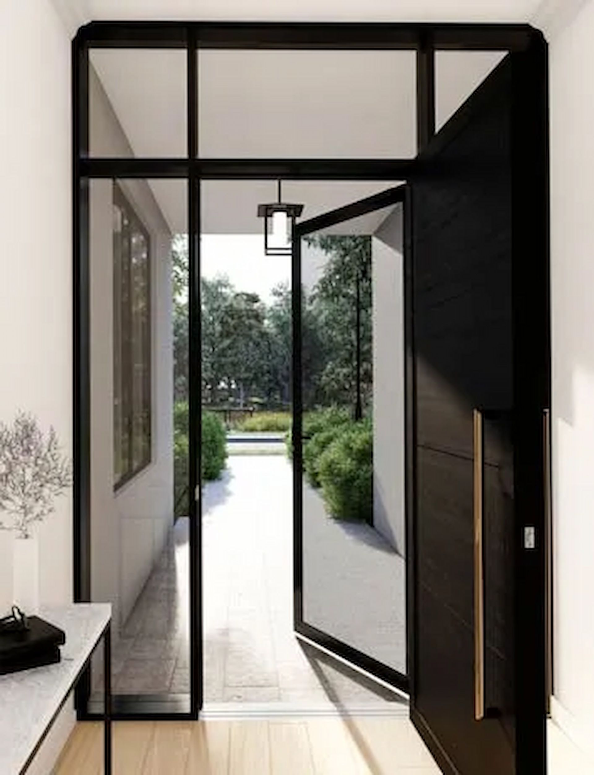 Black Framed Entryway With Open Door Leading to a Garden — Big Tom's Security Screens in Farleigh, QLD