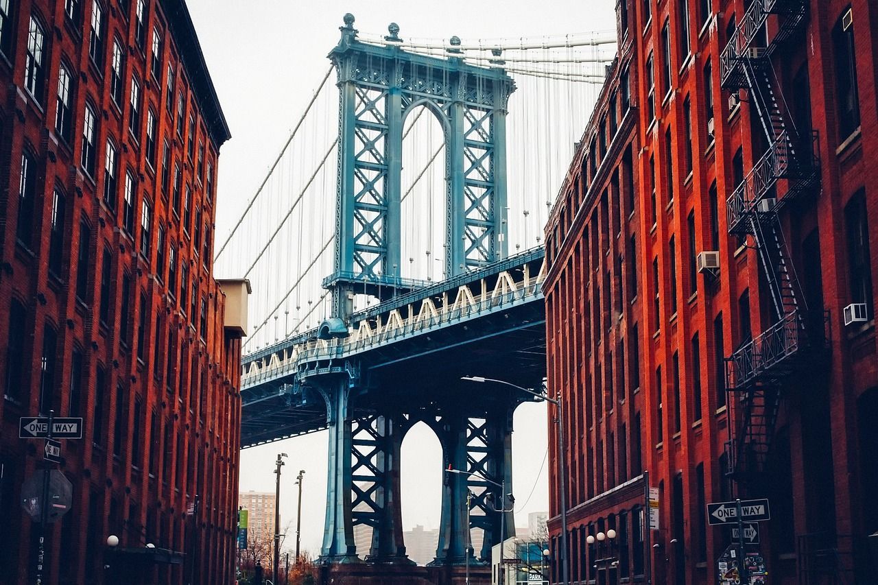 A bridge between two buildings in a city.