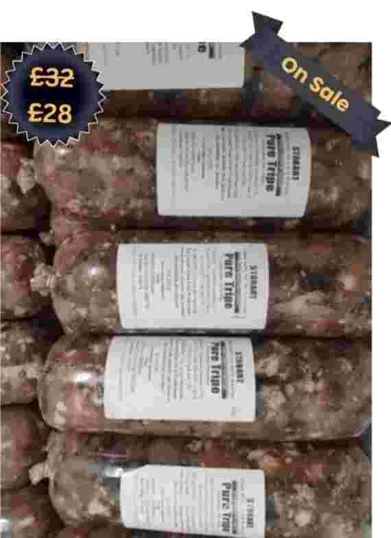 Stacked packages of raw dog food labeled