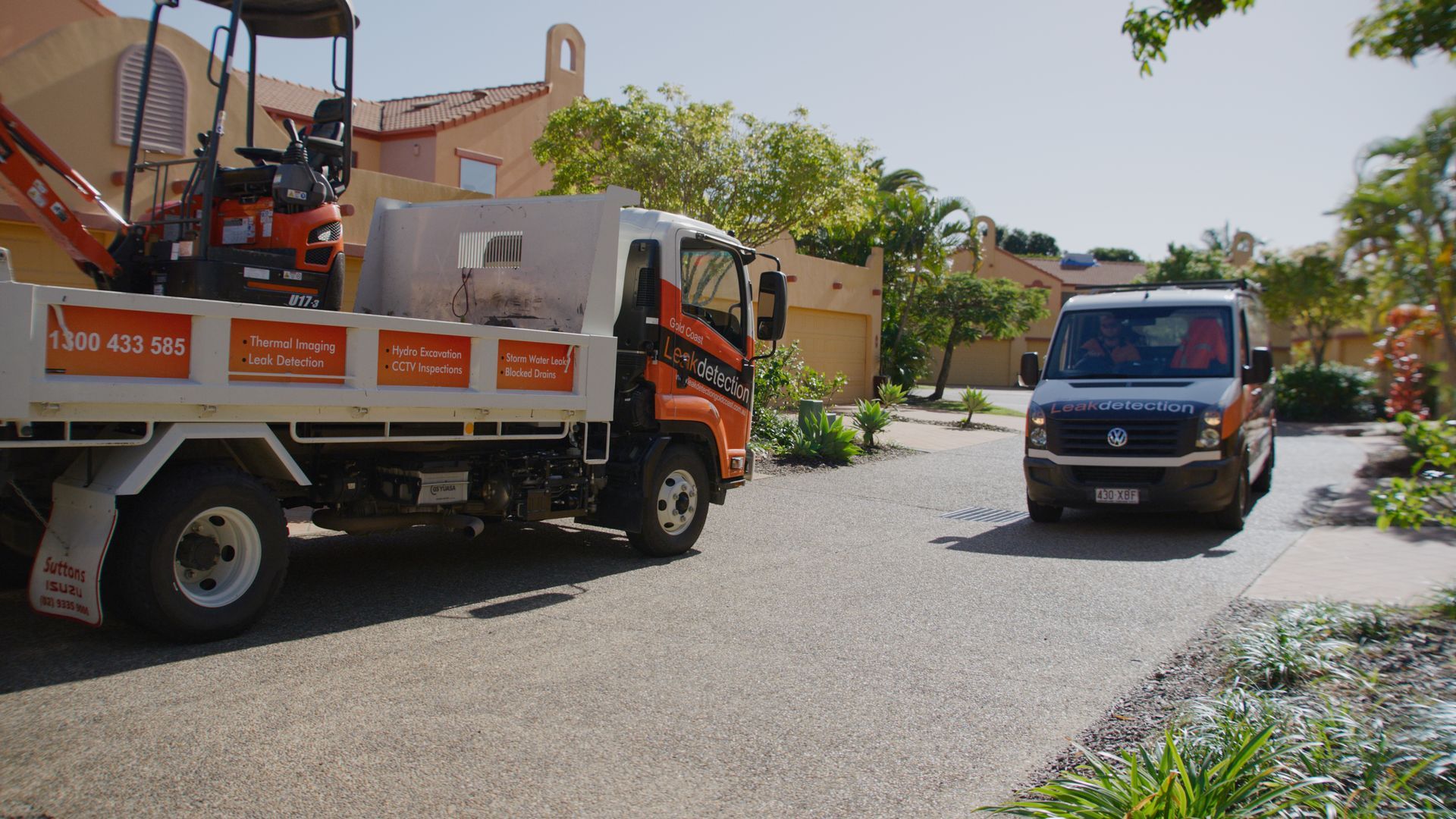 A Man Is Installing A Pipe In A Hole In The Ground — Tweed Heads Leak Detection in Terranora, NSW