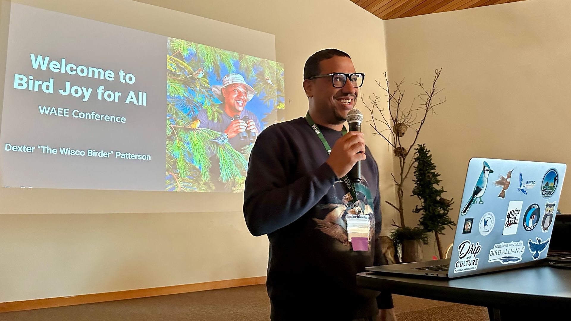 Man speaking at a presentation,