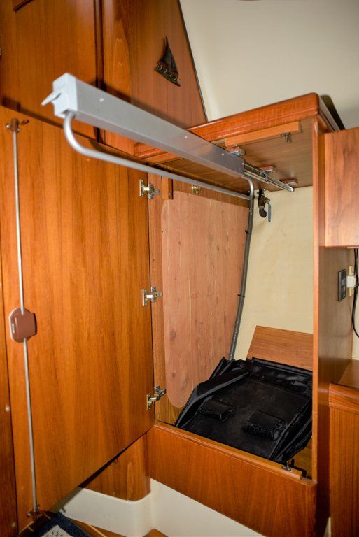 Hunter 44 DS master stateroom pull out clothes rail