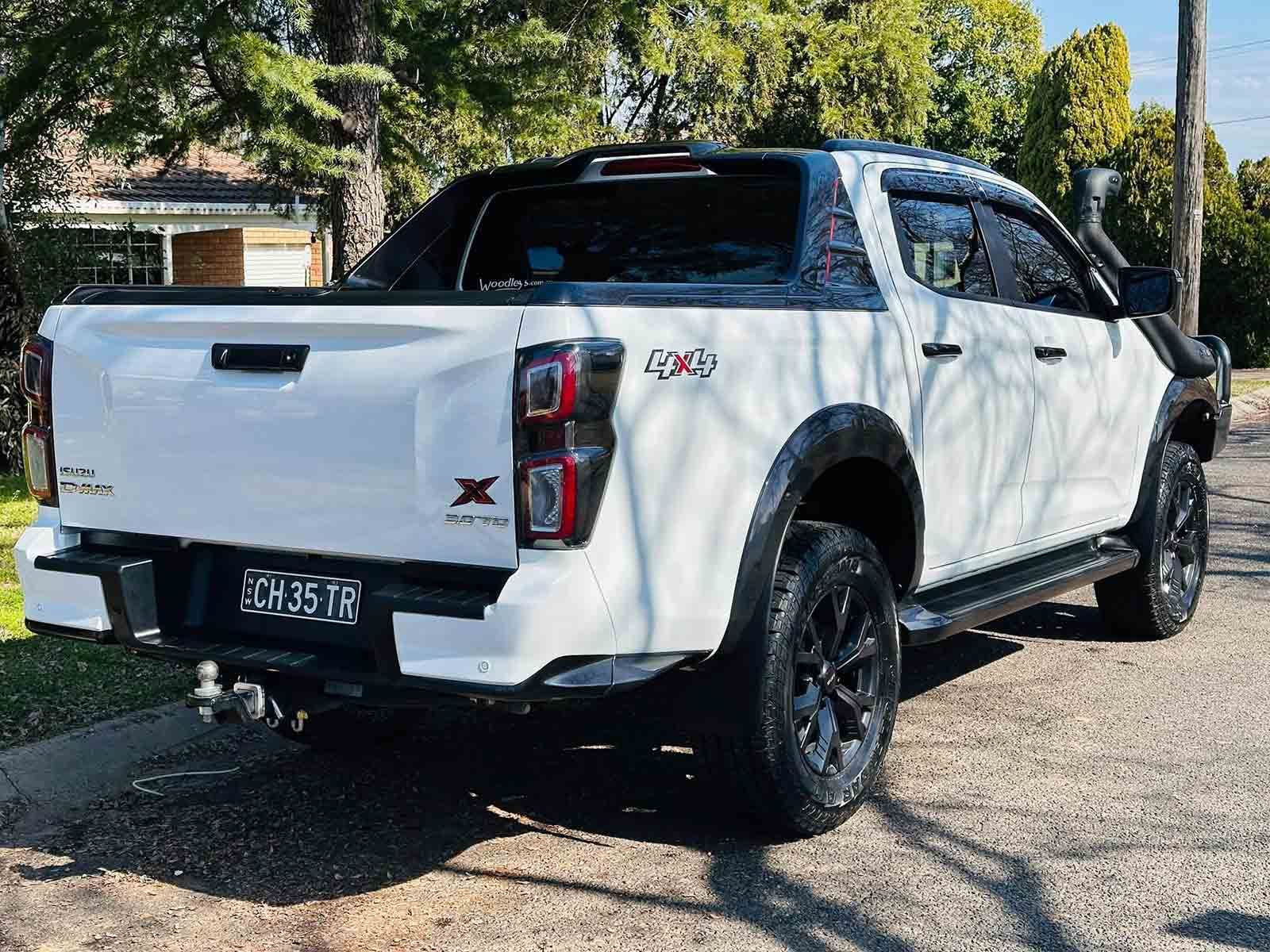 A White Truck Is Parked On The Side Of The Road — Brody’s Car Detailing In Oxley Vale, NSW