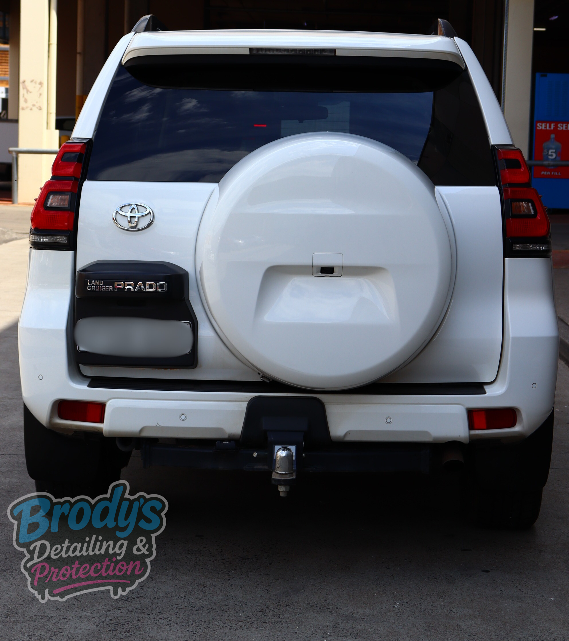 White Toyota Prado Suv Rear View With Spare Tyre — Brody’s Car Detailing In Tamworth, NSW