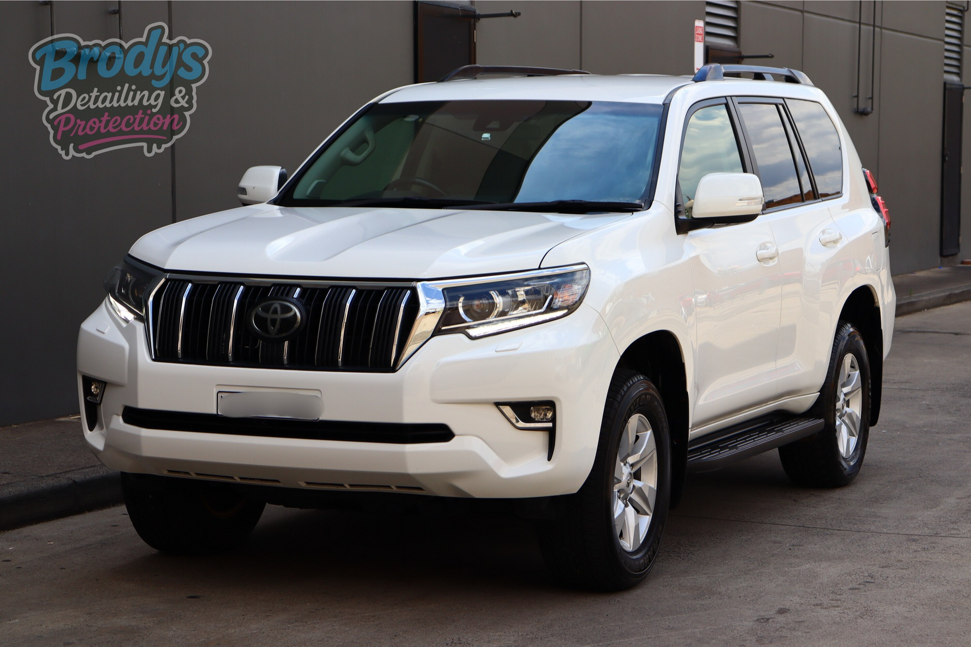 White Toyota Land Cruiser Prado Parked Outdoors — Brody’s Car Detailing In Tamworth, NSW