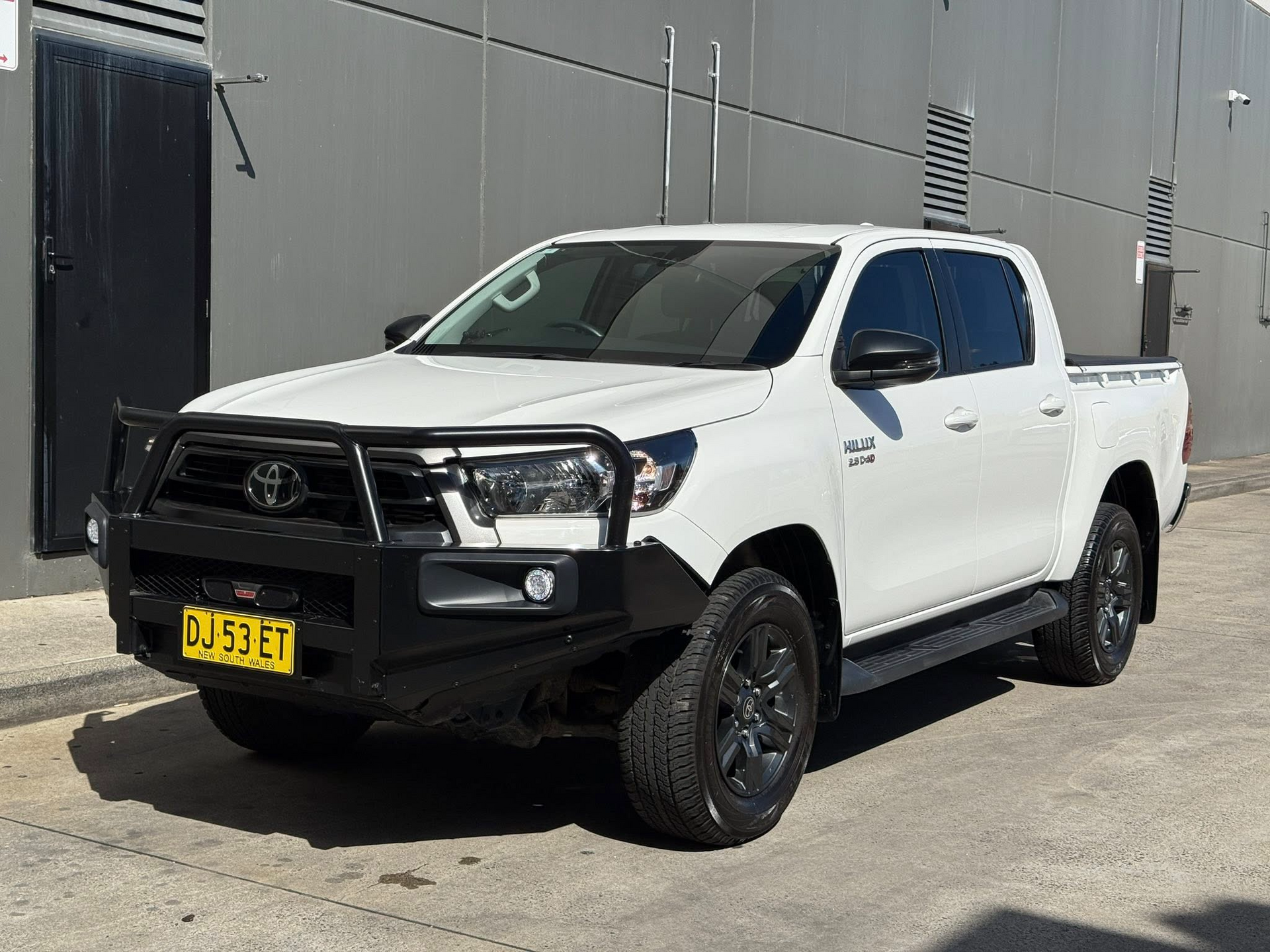 White Toyota Hilux Truck With Black Bull Bar — Brody’s Car Detailing In Tamworth, NSW