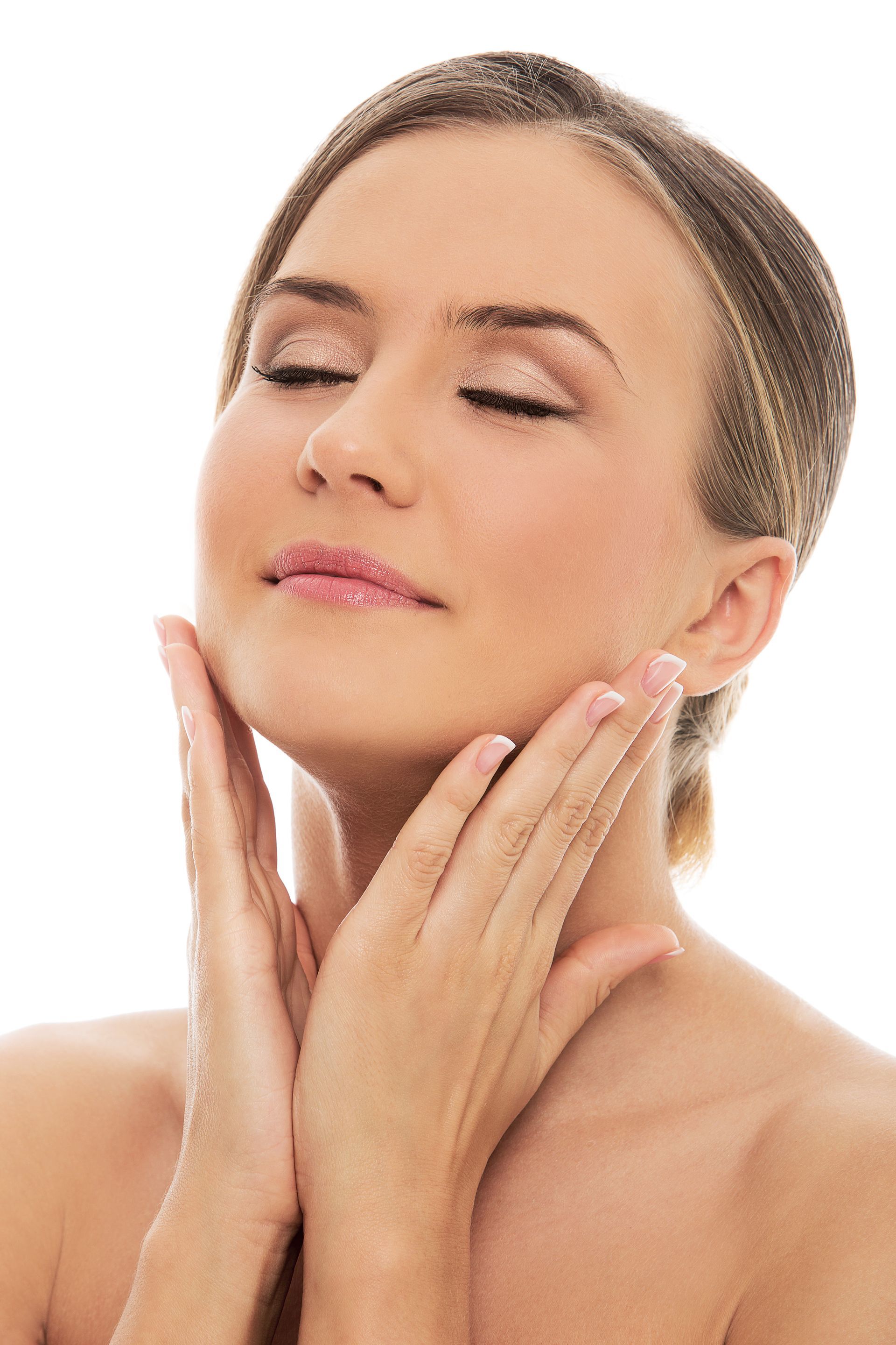 Woman's neck and face; hand gently touching her jaw. She has light skin and wrinkles.