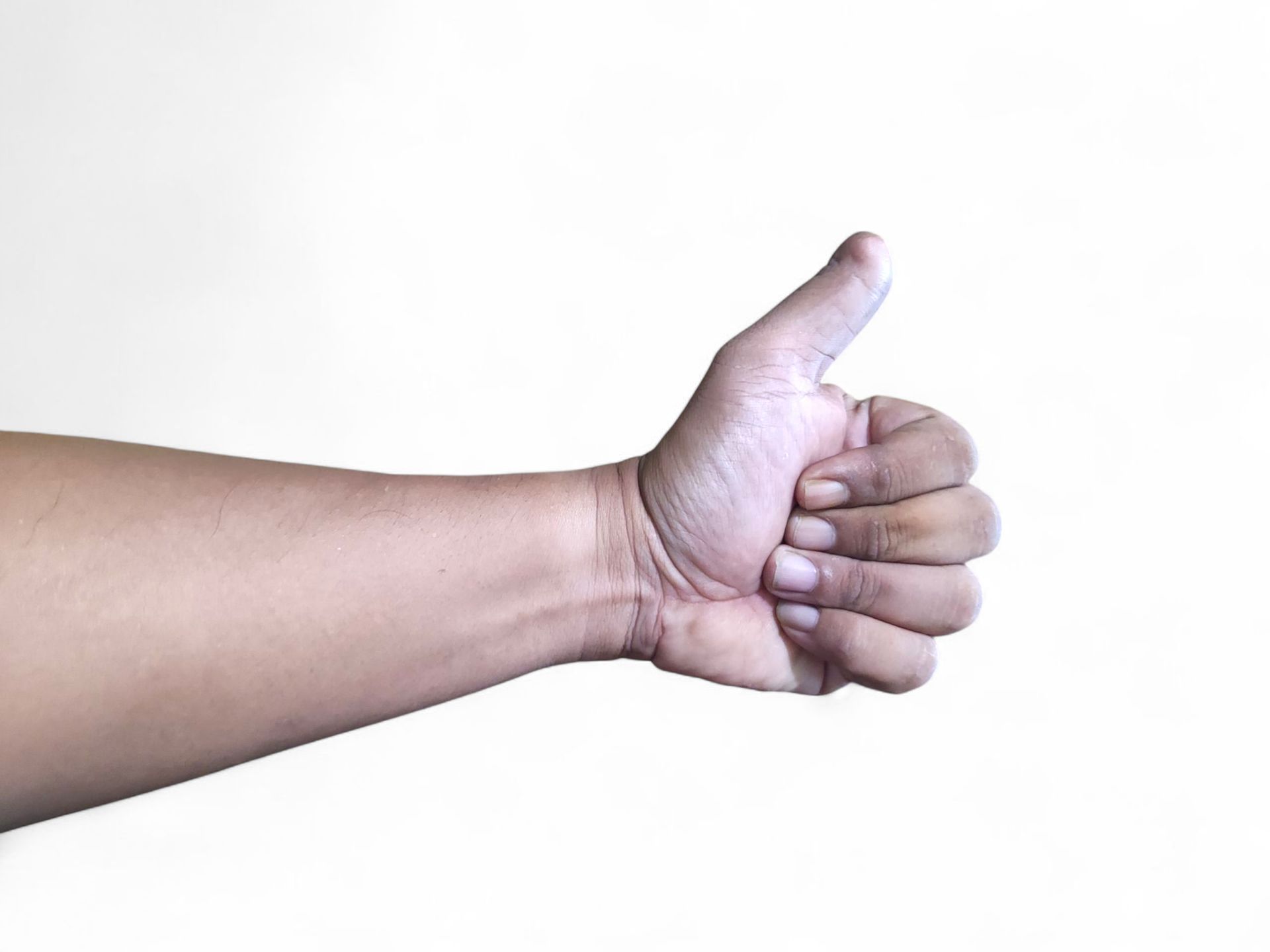 Hand giving thumbs up.