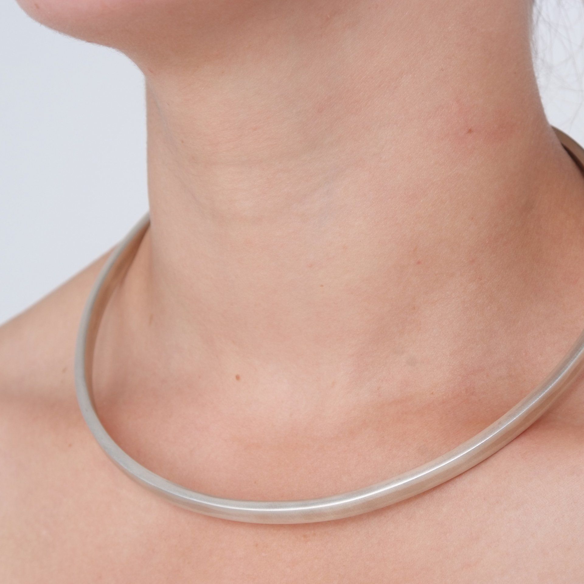 Hand forged silver neck piece Maps silver, quartz, wood architectural pendant ©Libby Day Design