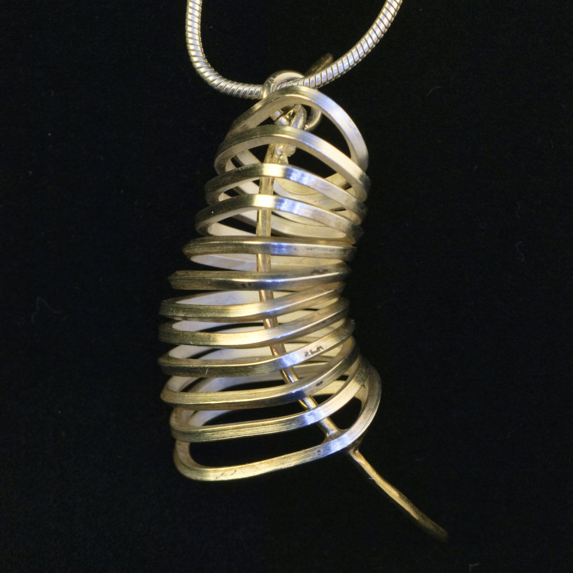 Bio pendant, gold and silver Maps silver, quartz, wood architectural pendant ©Libby Day Design