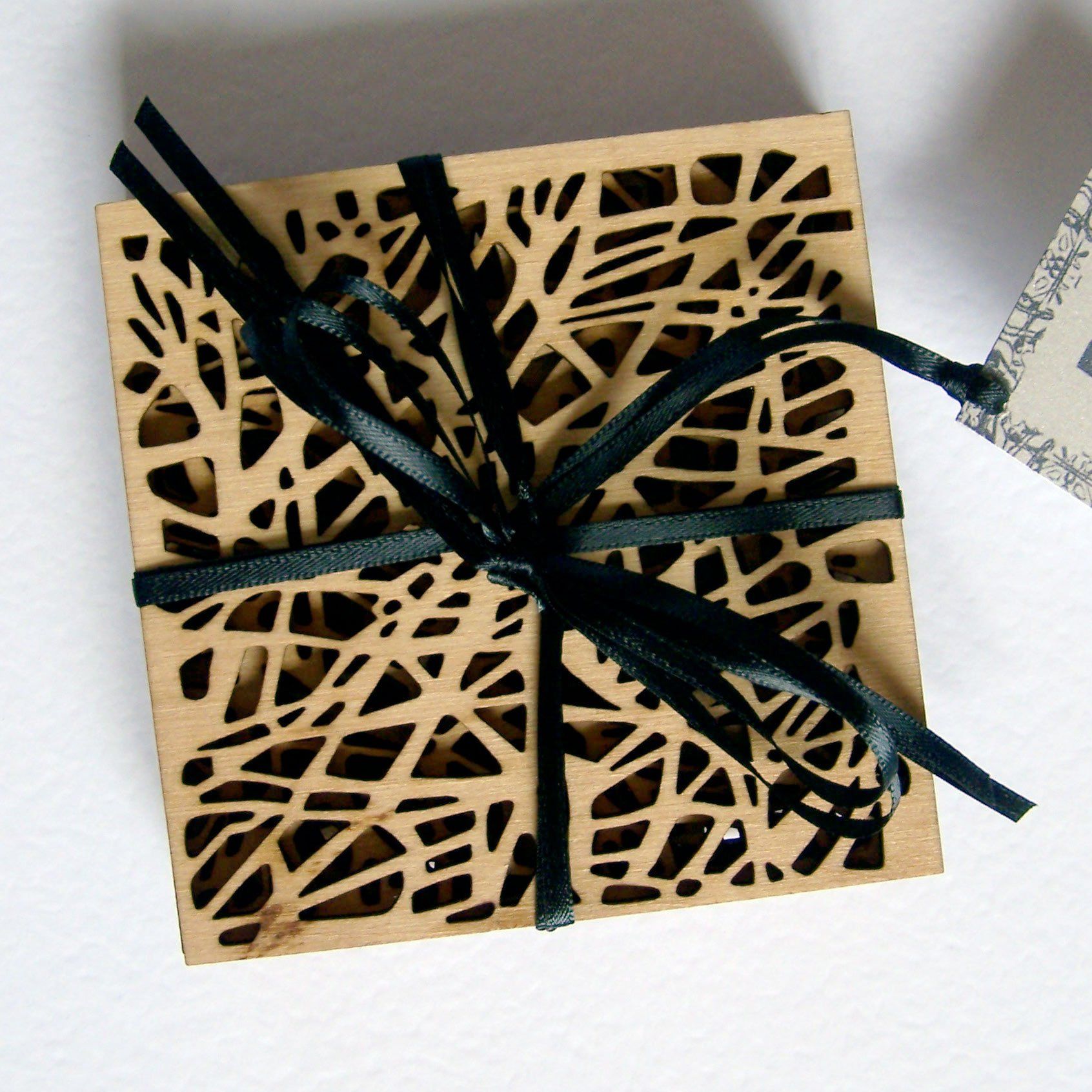 Of Trees, pear wood laser cut coasters ©Libby Day Design