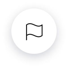 A black and white icon of a flag in a white circle.