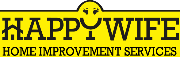 A yellow sign that says happy wife home improvement services