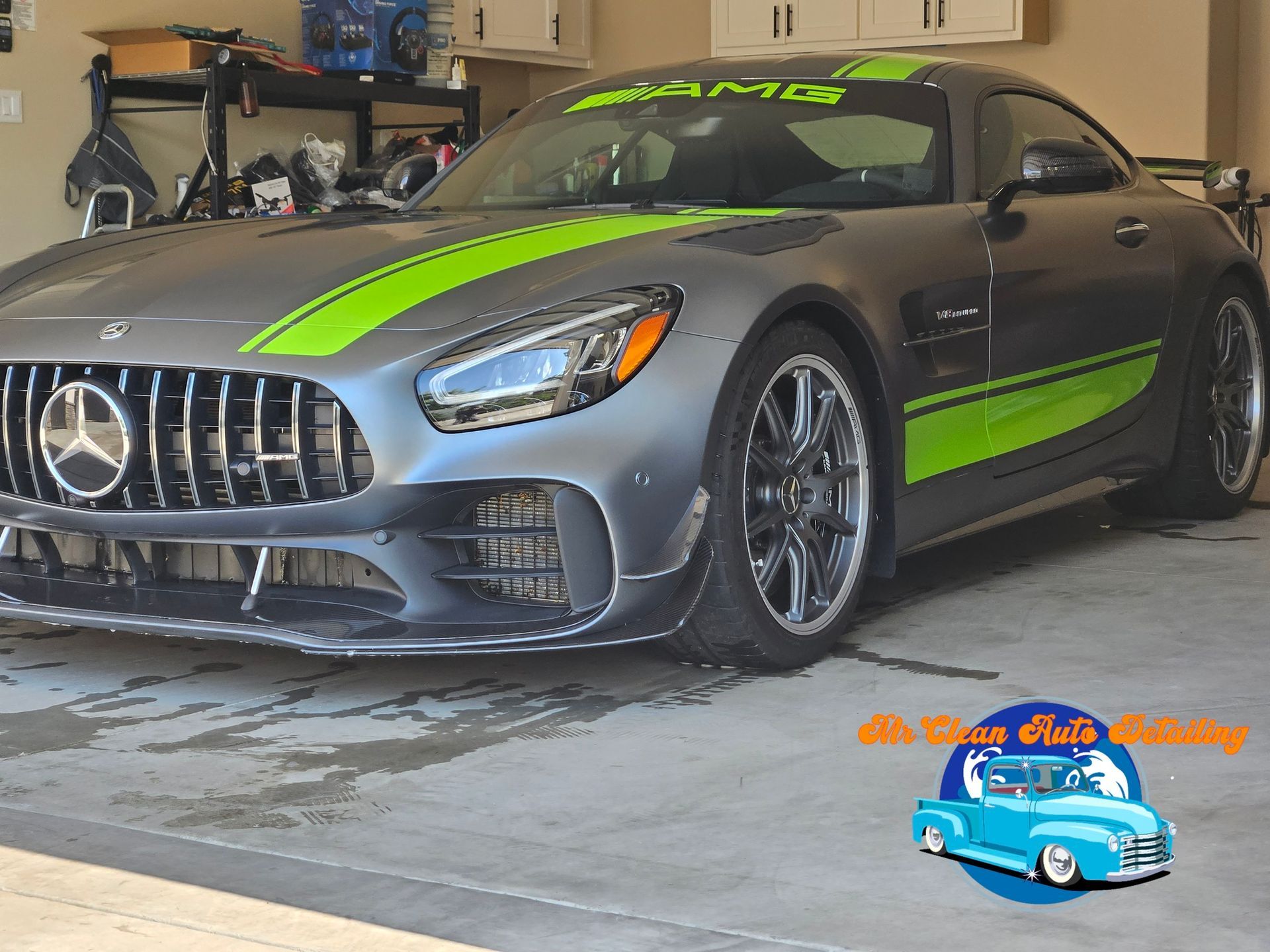 A mercedes amg sports car is parked in a garage