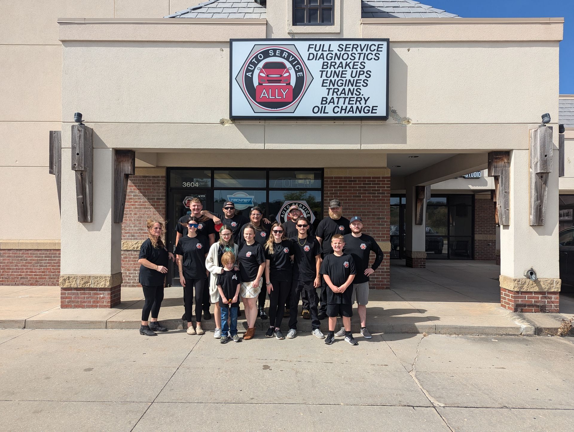 group photo near front gate | Ally Auto Service