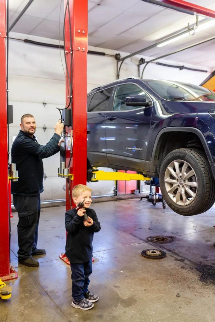 child observing a car | Ally Auto Service