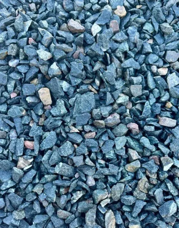 Dark gray and teal crushed gravel, close-up view.
