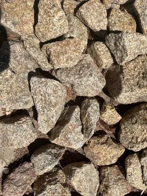 Pile of light brown and tan rocks.