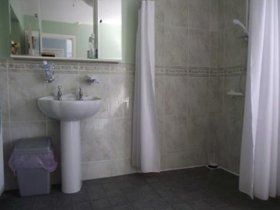 Bathroom Tiling - Derry, County Londonderry - Top Plumbing & Heating - Bathroom sink and tiles