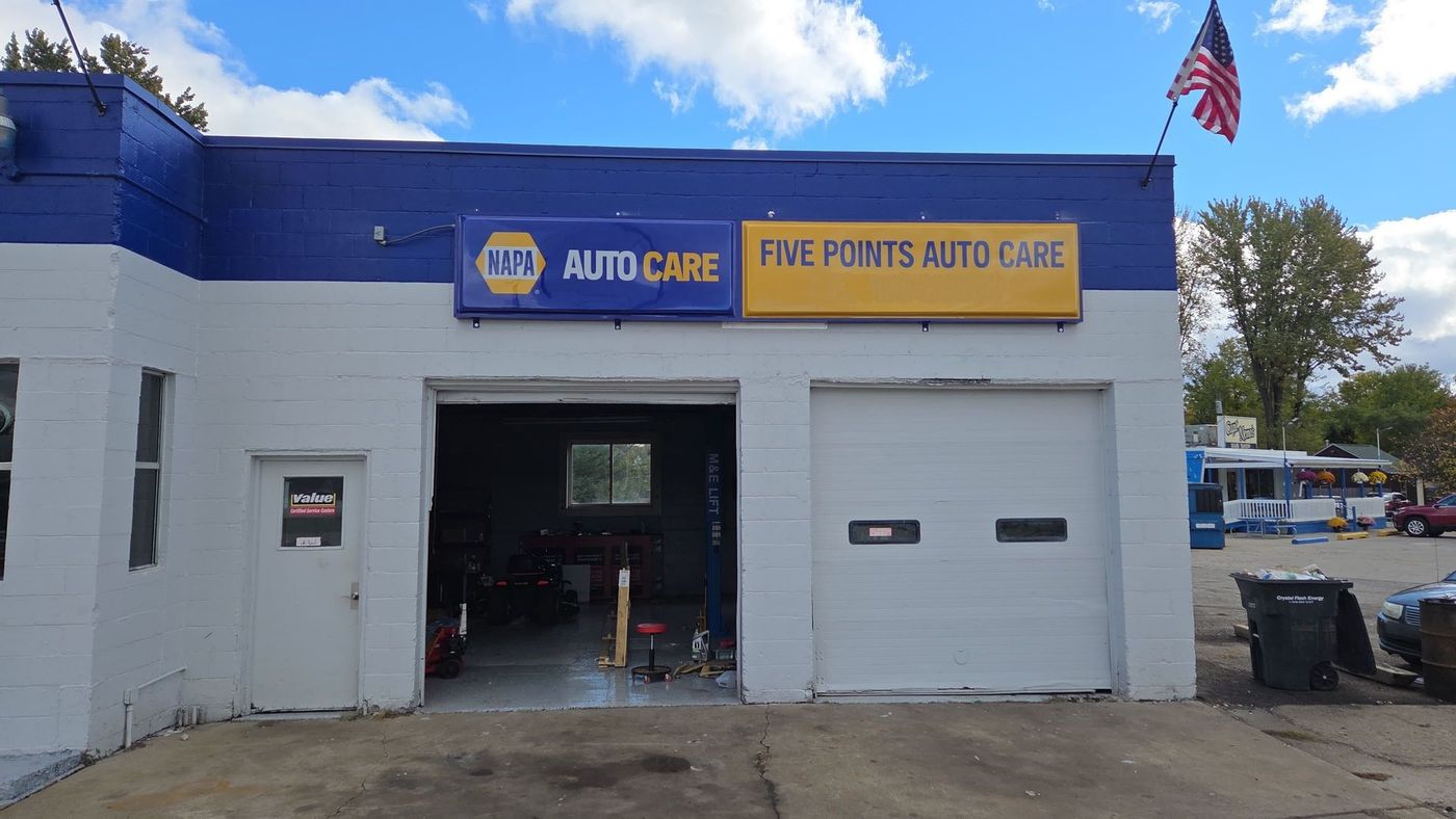 Blue and white auto repair shop with