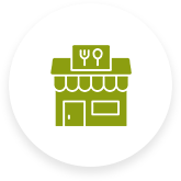 A green icon of a store with a fork on top of it.