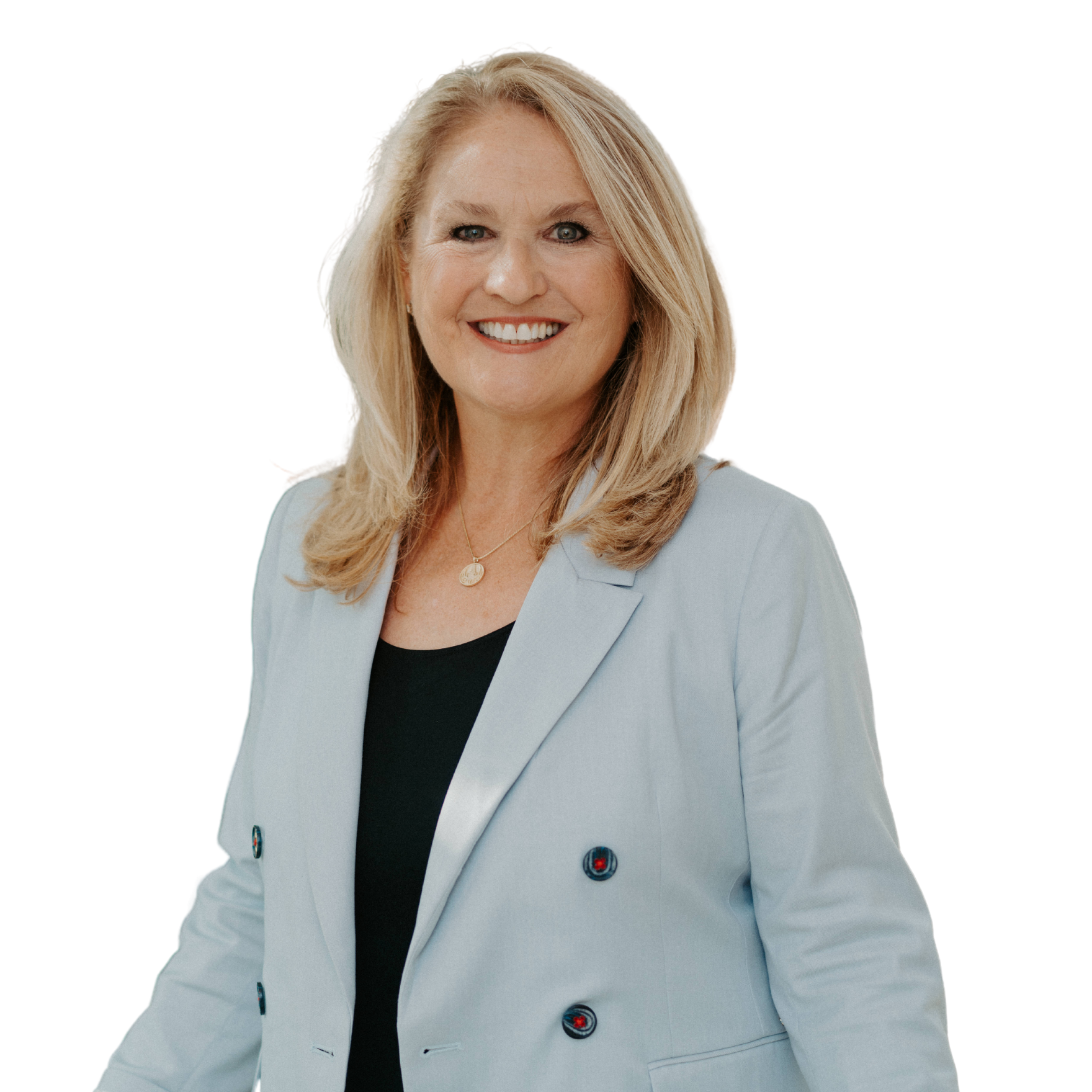 Woman with blonde hair wearing a light blue blazer and black top smiles.