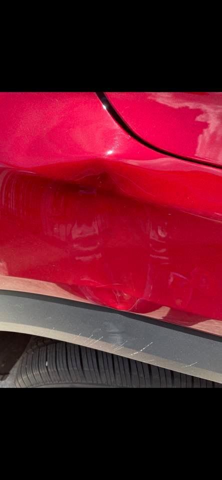 Red Car Dents — Grovetown, GA — The Dentist Paintless Dent Repair