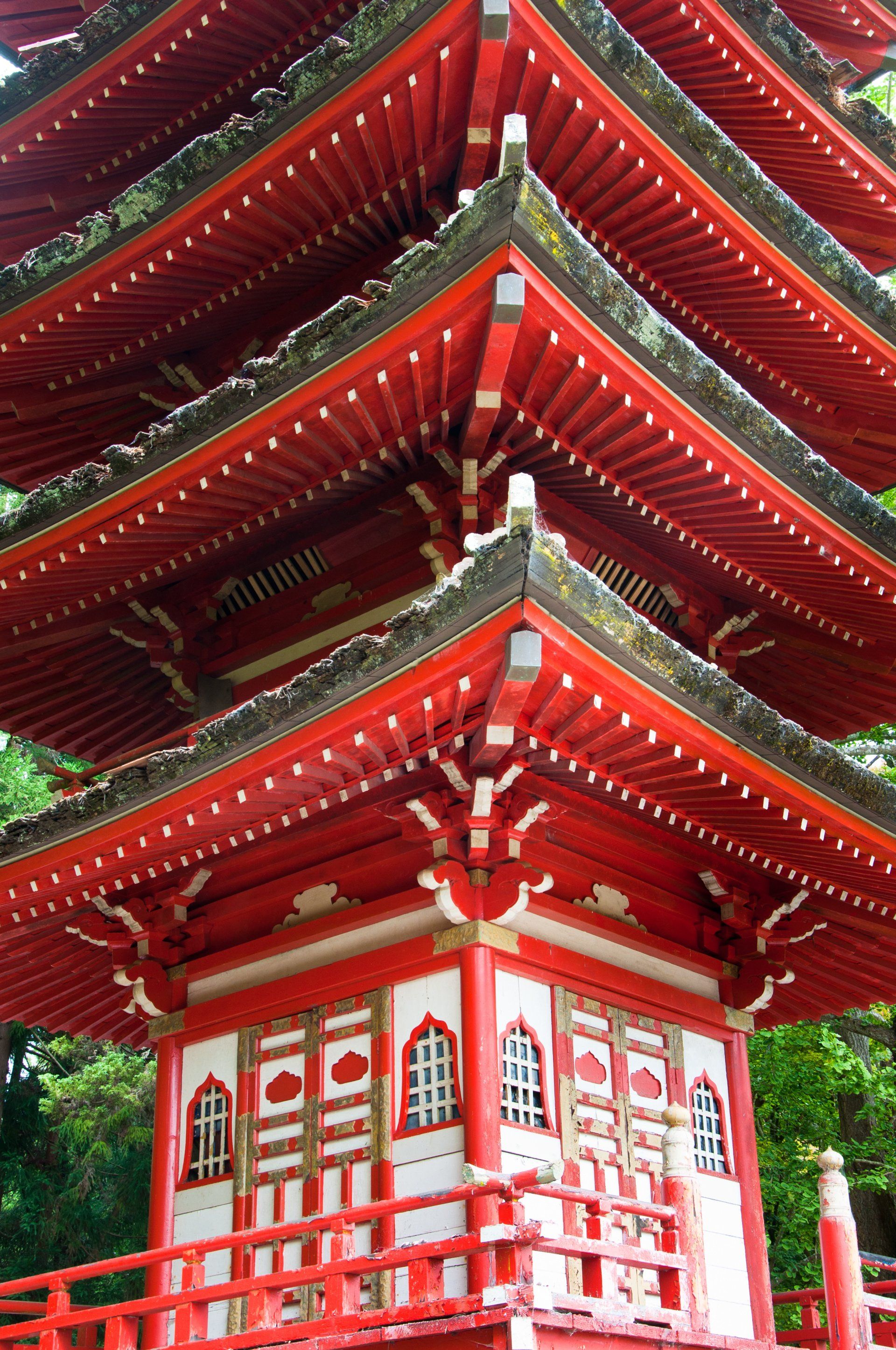 A red and white building with chinese writing on it