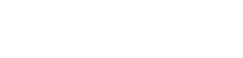Primer plano de un pequeño mecanismo de relojería metálico con varios engranajes y ruedas dentadas de latón interconectados.