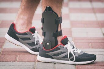 Man wearing ankle brace – Personalized Orthopedics ni Albany, NY